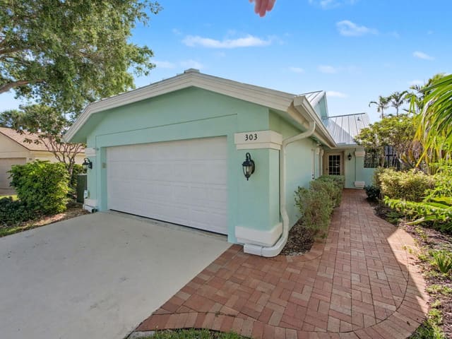 303 Leeward Drive, sold in River, Jupiter, FL