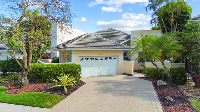 7780 Travelers Tree Drive, sold in Palms At Boca Pointe, Boca Raton, FL