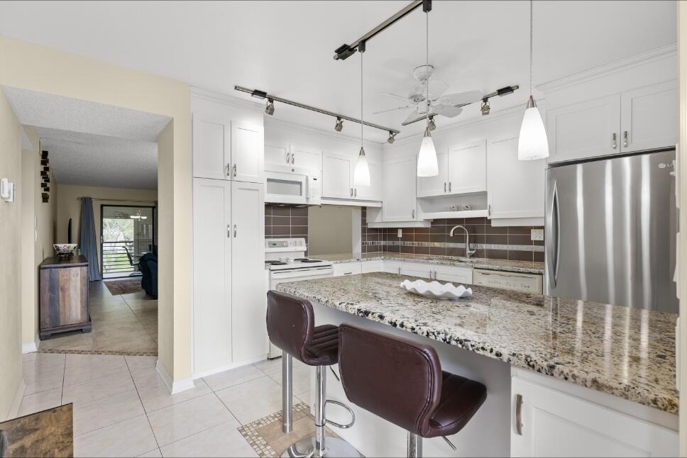 6095 N Sabal Palm Boulevard 210, Tamarac, FL 33319, Tamarac