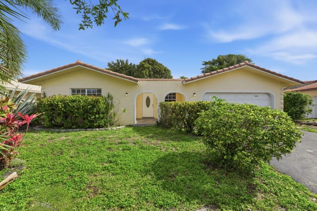 8491 NW 26th Drive, sold in Forest Hills South, Coral Springs, FL