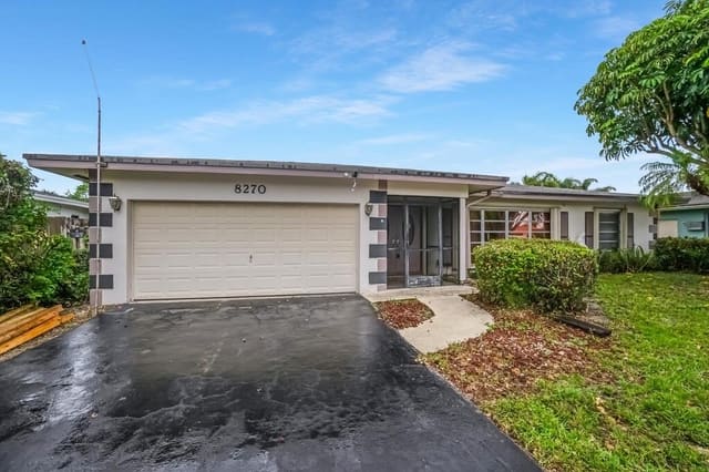 8270 NW 66th Terrace, sold in Sunflower, Tamarac, FL