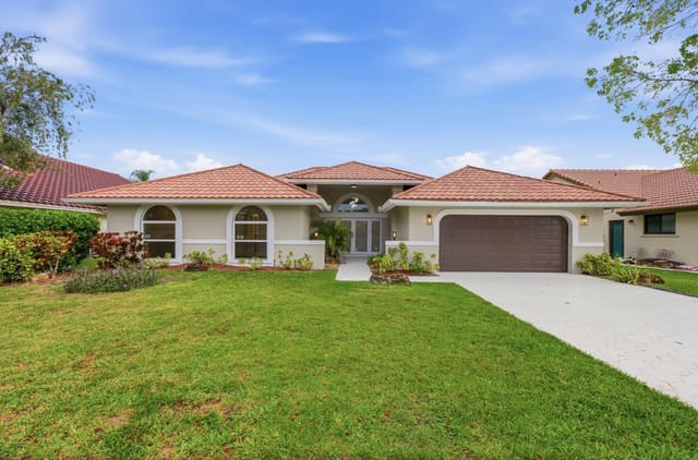 9677 N Springs Way, Coral Springs, FL 33076