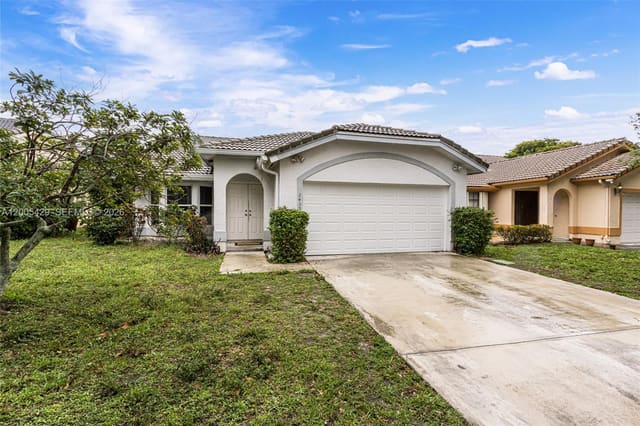 2439 NW 95th Avenue, sold in Coral Springs University, Coral Springs, FL