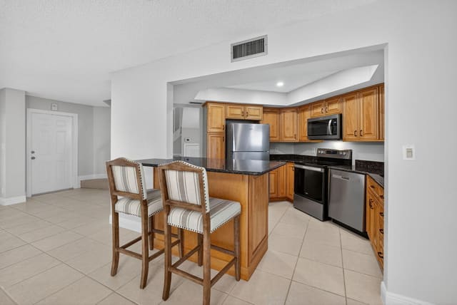 246 Seabreeze Circle, sold in Sea Brook Place Condo, Jupiter, FL