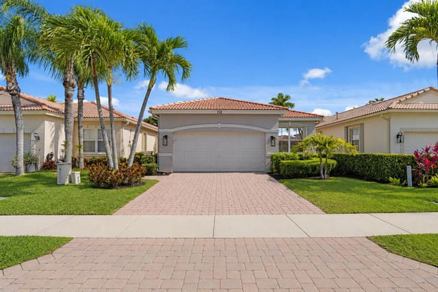 112 Isle Verde Way, sold in Mirabella At Mirasol B, Palm Beach Gardens, FL
