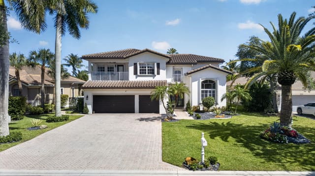 12262 NW 49th Drive, sold in Wyndham Lakes West, Coral Springs, FL