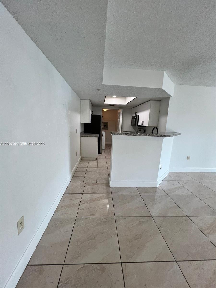 5065 Wiles Road 103 — photo 10