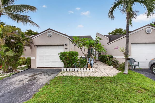 5028 NW 11th Way, sold in The Lakes, Deerfield Beach, FL