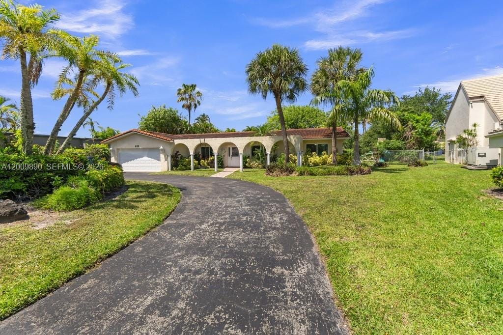 620 Lake Dasha Circle, Plantation, FL 33324 photo 3