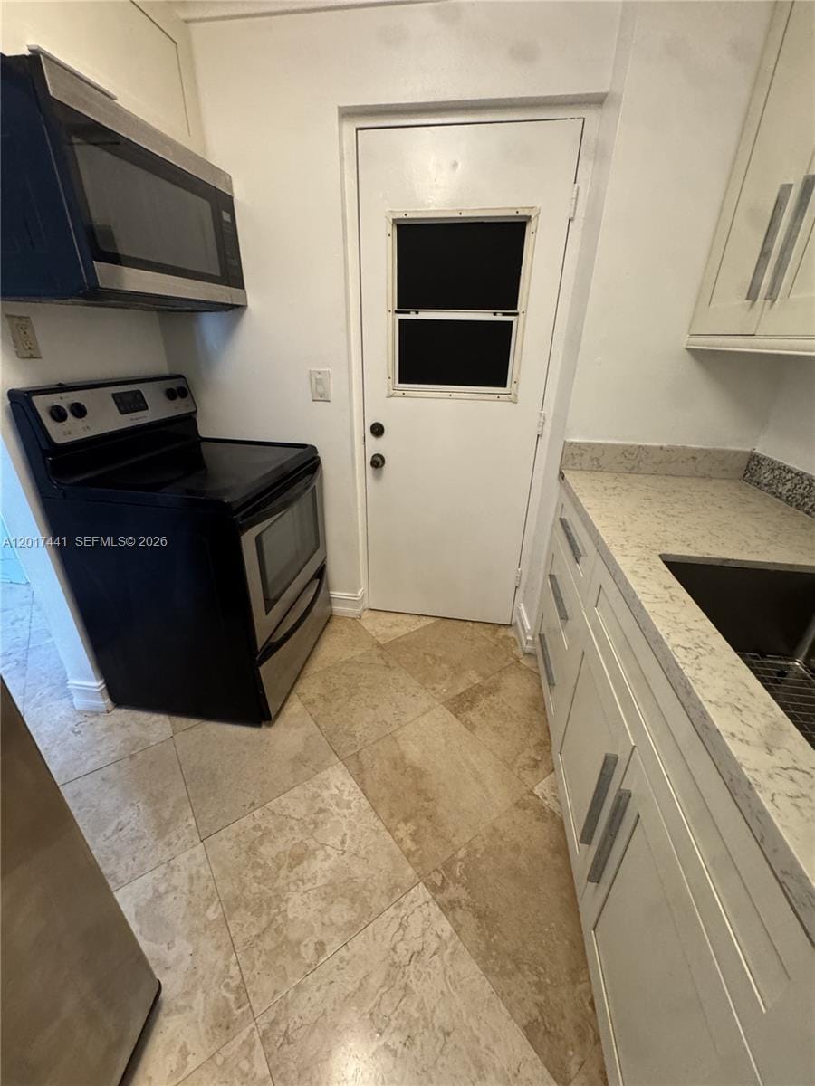 1407 NE 56th Street 316 — photo 1