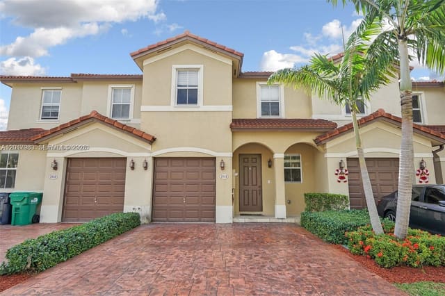 1048 NE 208th Street, sold in Ives Dairy Townhomes, Miami, FL