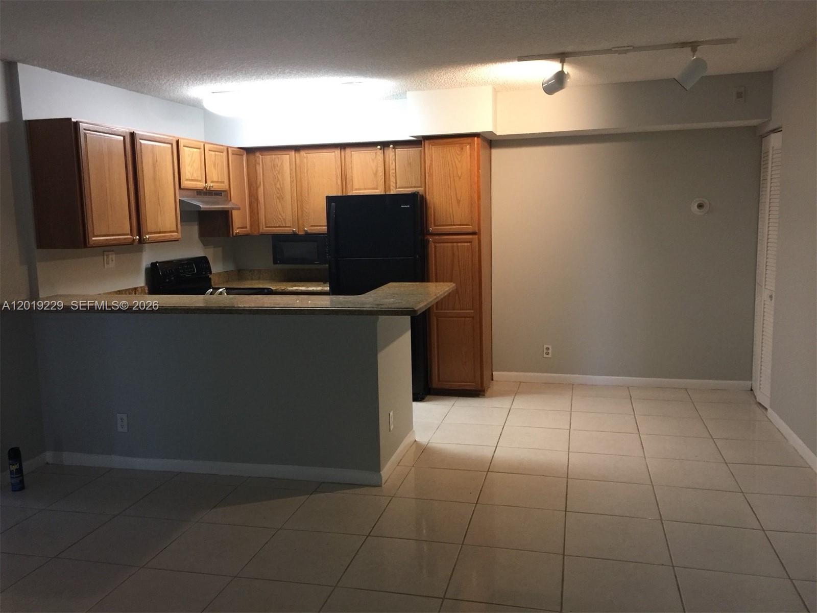 841 Lyons Road 24201, Coconut Creek, FL 33063