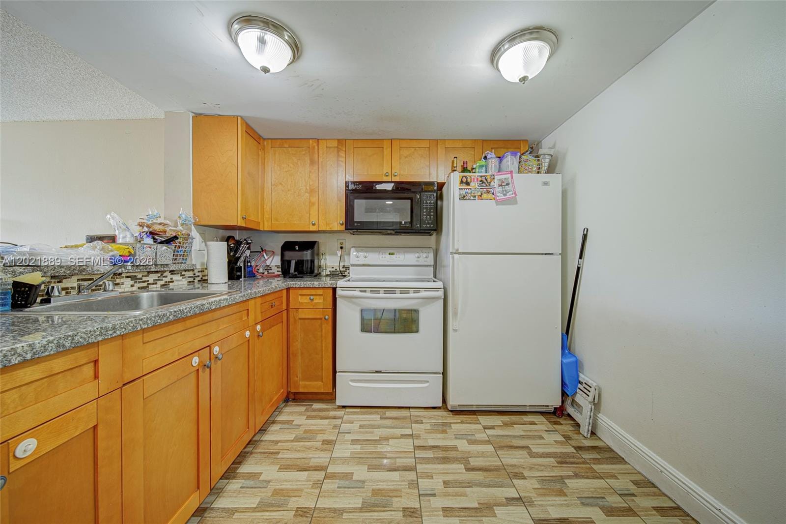 494 NW 165th St Road C-205 — photo 12