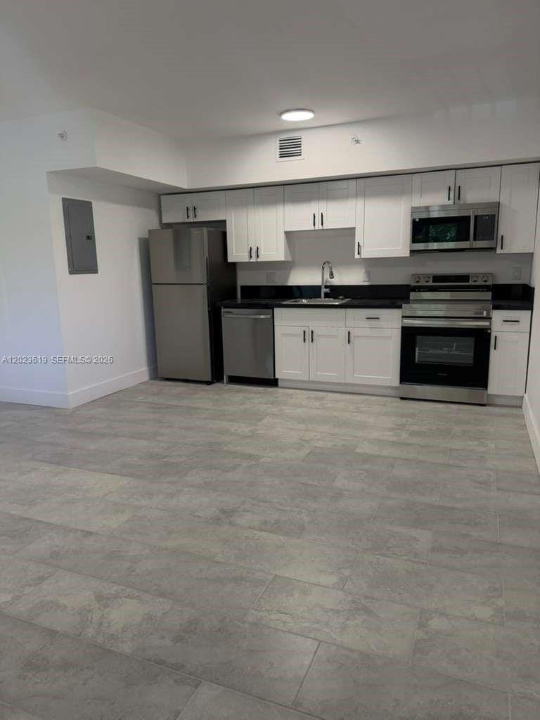 147 NW 59th Street 304 — photo 2