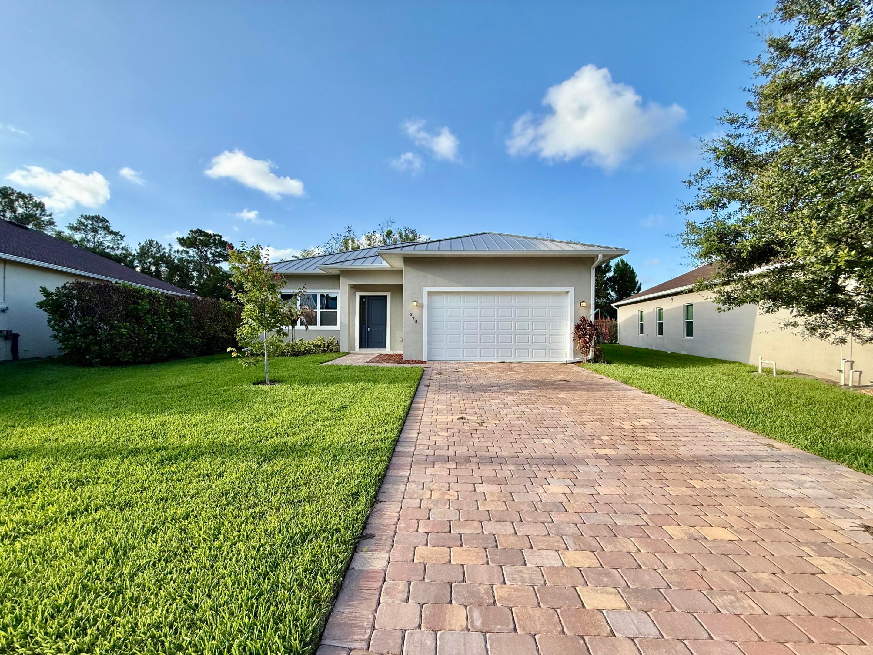 675 NE Moss Rose Place, Port St. Lucie, FL 34983, Port St Lucie