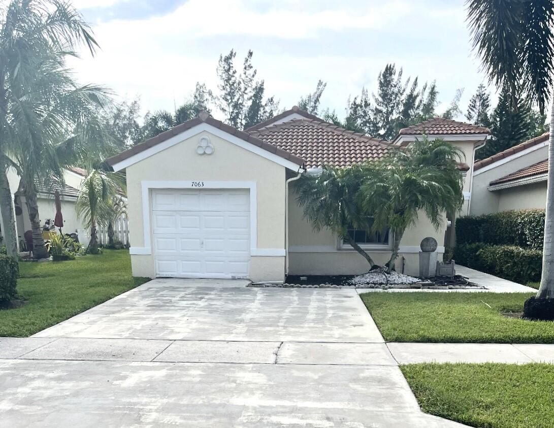 7063 Burgess Drive, Greenacres, FL 33467, Greenacres
