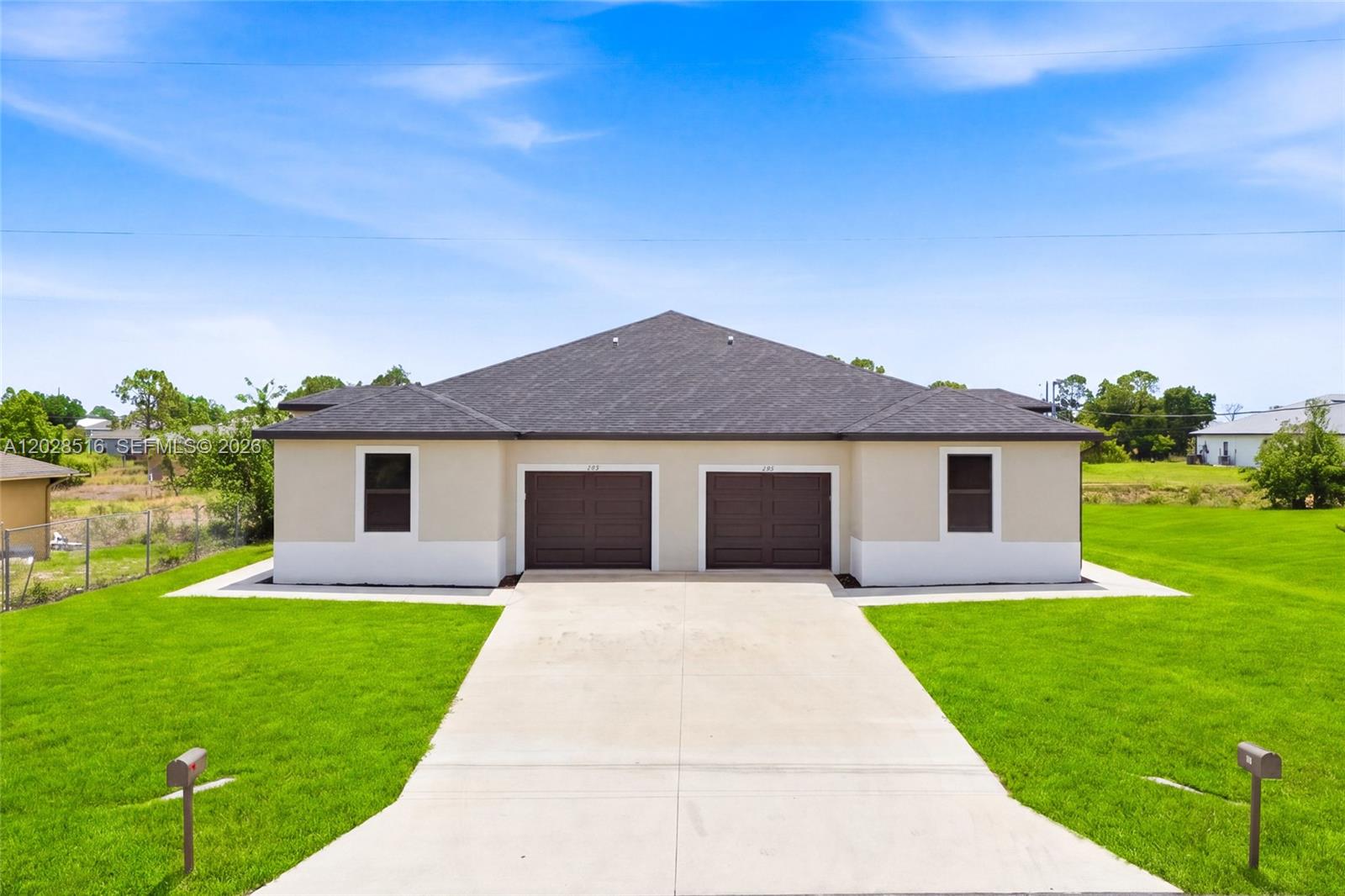 225/227 Hightower Avenue S, Lehigh Acres, FL 33973