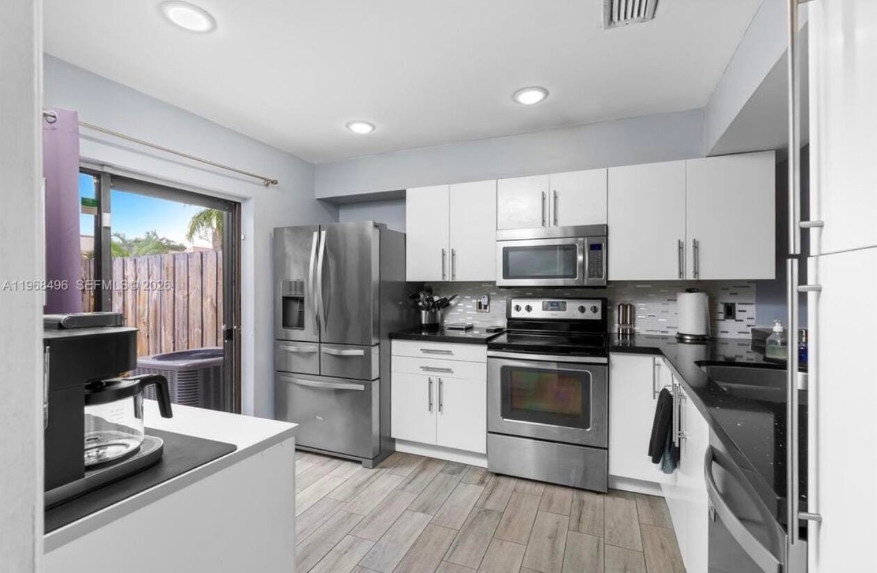 2900 NW 69th Court — photo 8