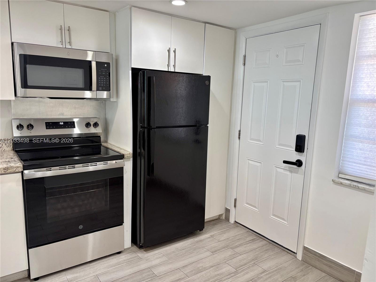 1591 NE Miami Gardens Drive 112 — photo 2