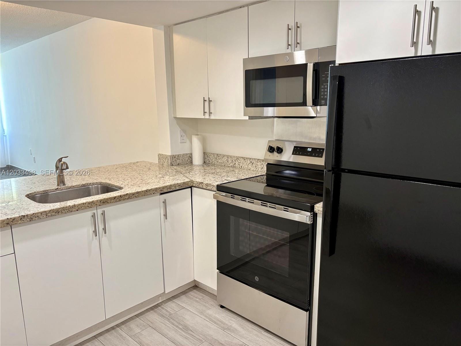 1591 NE Miami Gardens Drive 112 — photo 3