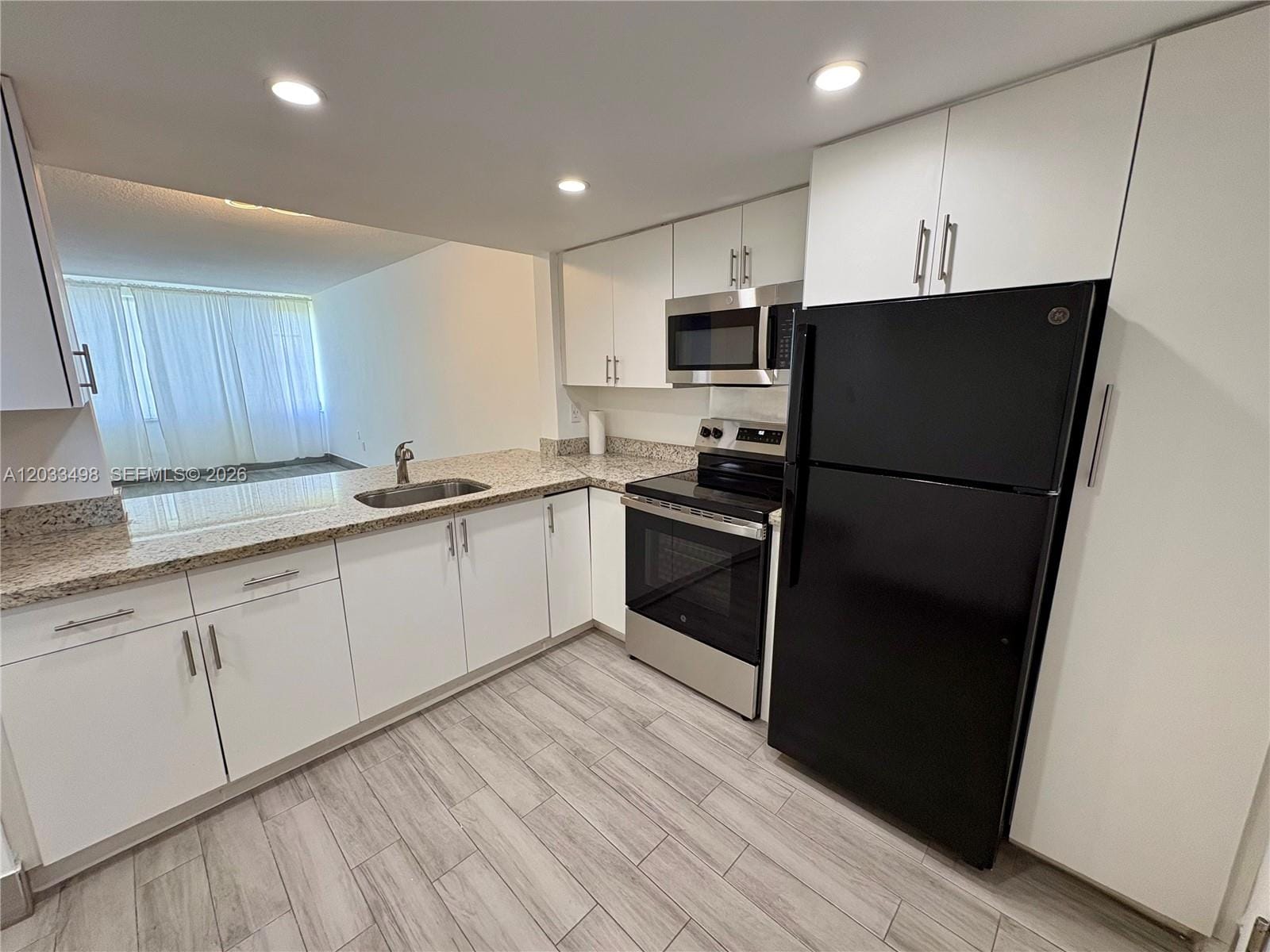 1591 NE Miami Gardens Drive 112 — photo 4