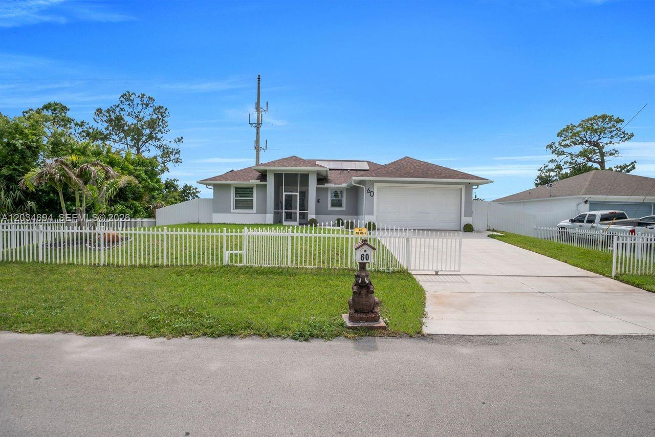 60 Floyd Avenue S, Lehigh Acres, FL 33976
