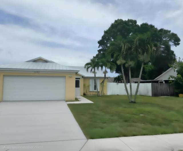 1402 Denlow Lane, Royal Palm Beach, FL 33411