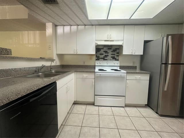 5011 Wiles Road 207, Coconut Creek, FL 33073