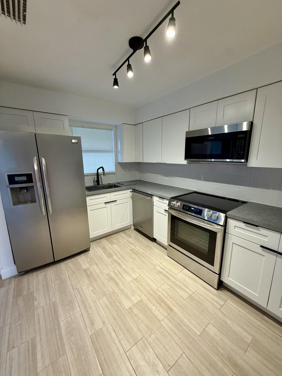 3104 Poolside Drive, Greenacres, FL 33463