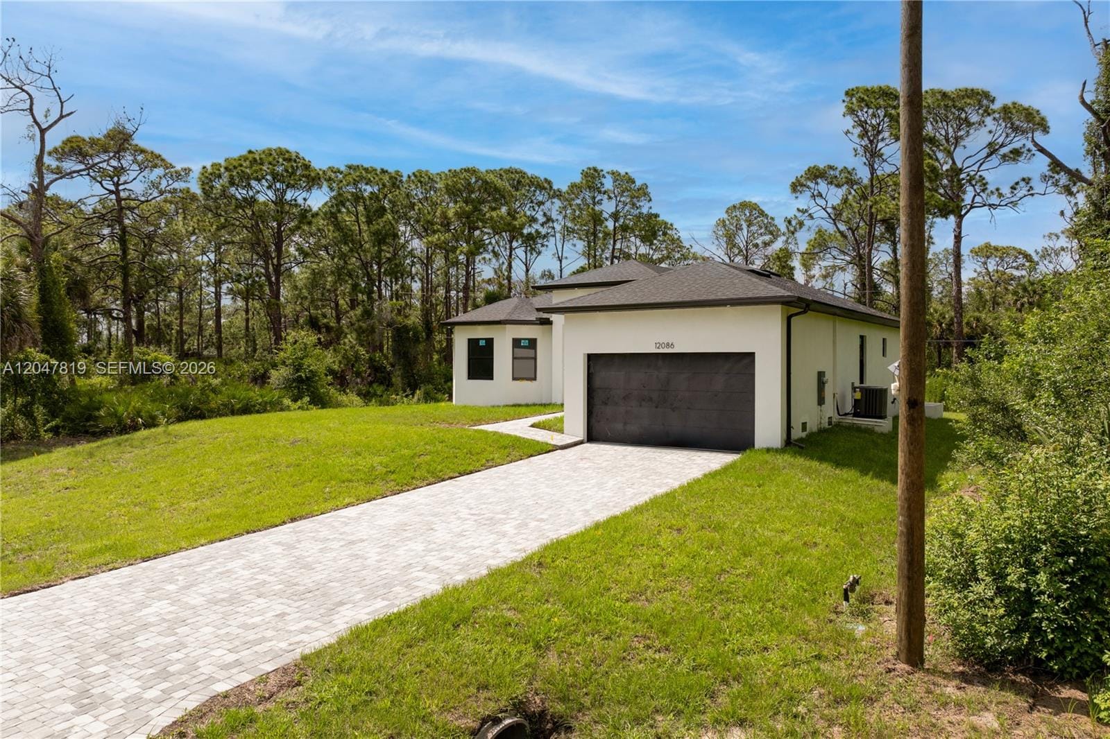 12086 Chamberlain Boulevard, Port Charlotte, FL 33953 photo 2