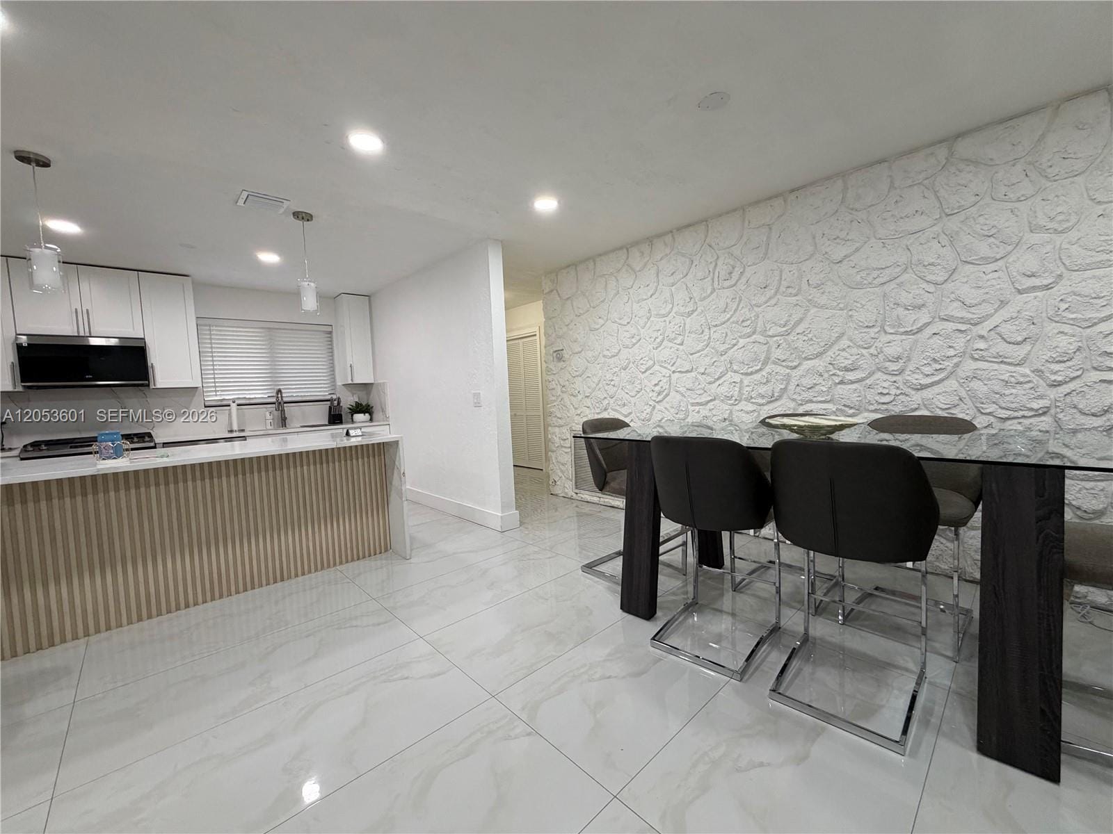 4700 NW 1st Court — photo 2