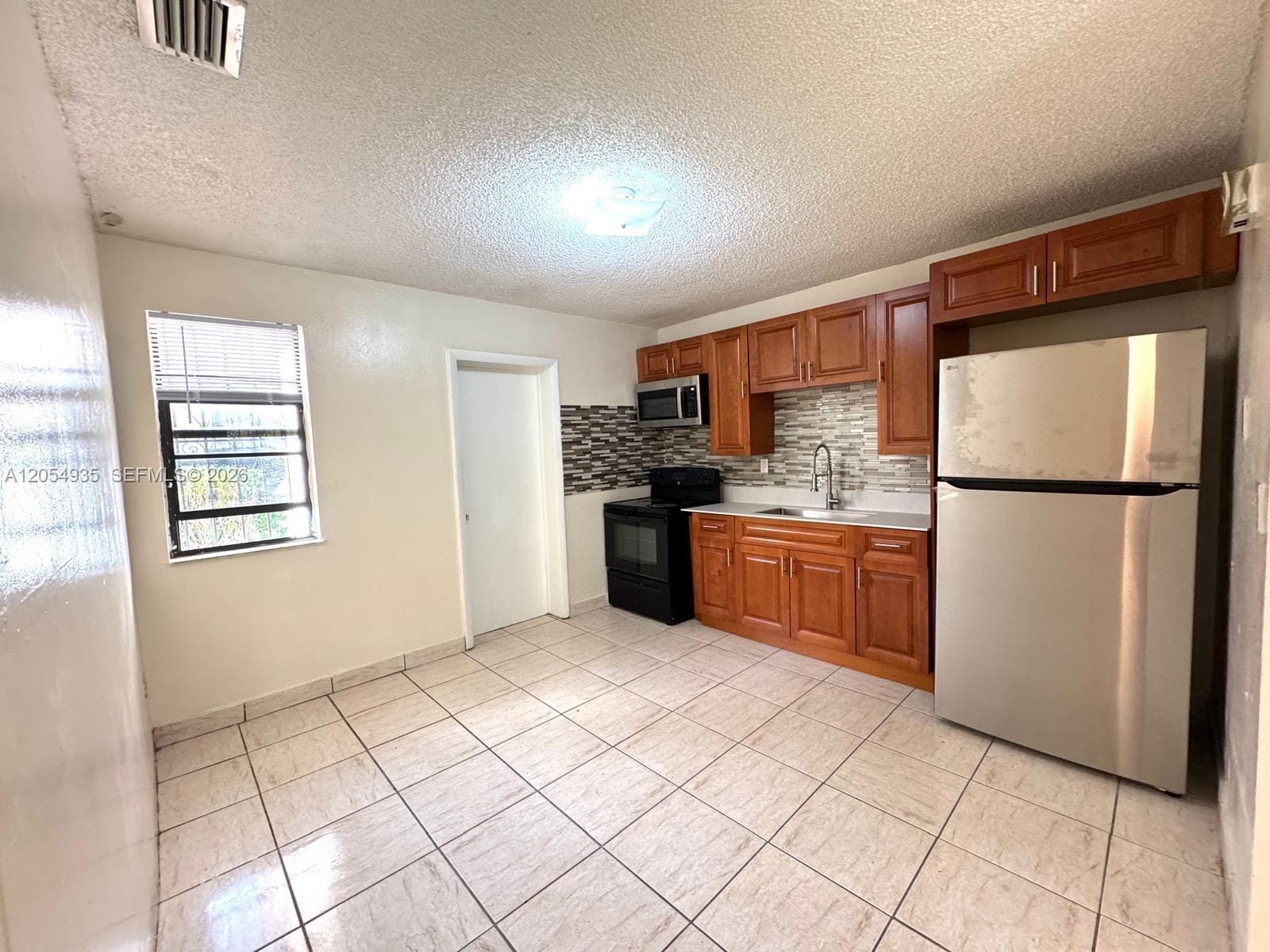 7715 NW 2nd Court 0 — photo 2