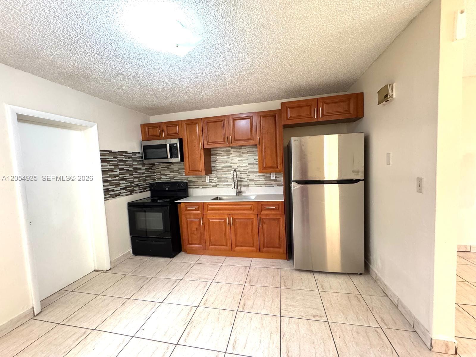 7715 NW 2nd Court 0 — photo 5