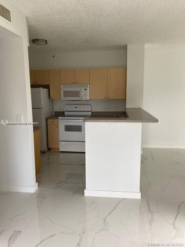 7980 N Nob Hill Road 102 — photo 4
