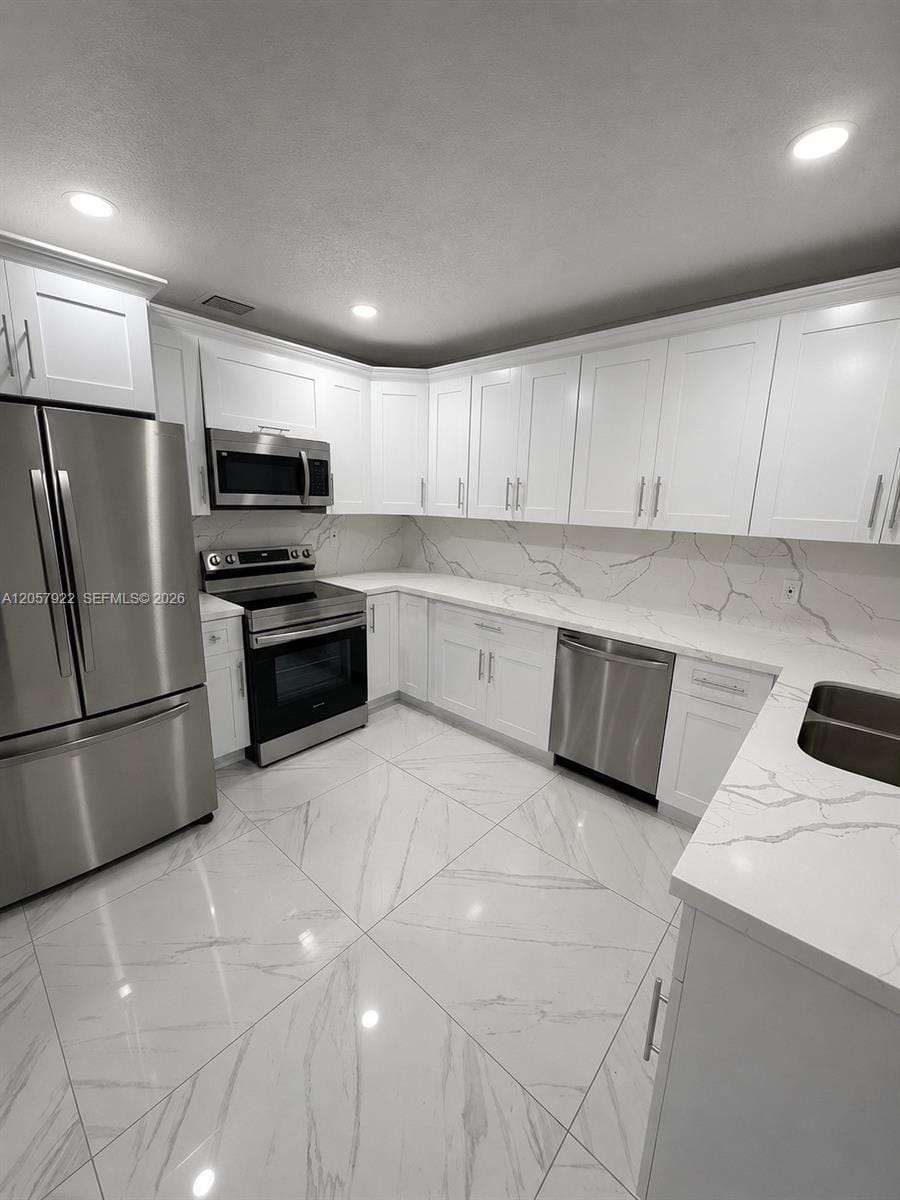 552 NE 161st Street — photo 3