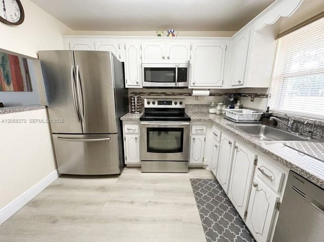 9801 Sunrise Lakes Boulevard 203, Sunrise, FL 33322
