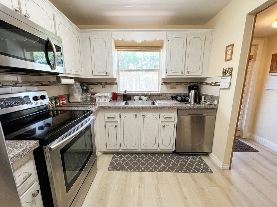 9801 Sunrise Lakes Boulevard 203, Sunrise, FL 33322 photo 2