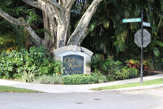 1720 W Oak Knoll Circle, sold in Pine Lake Ridge, Davie, FL