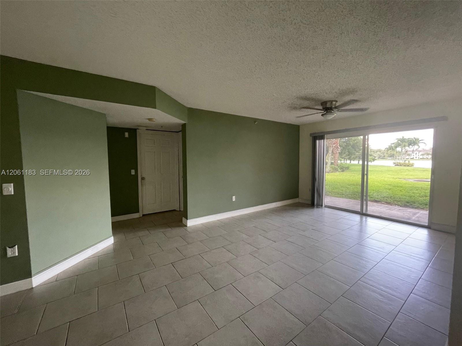 5005 Wiles Road 102 — photo 1