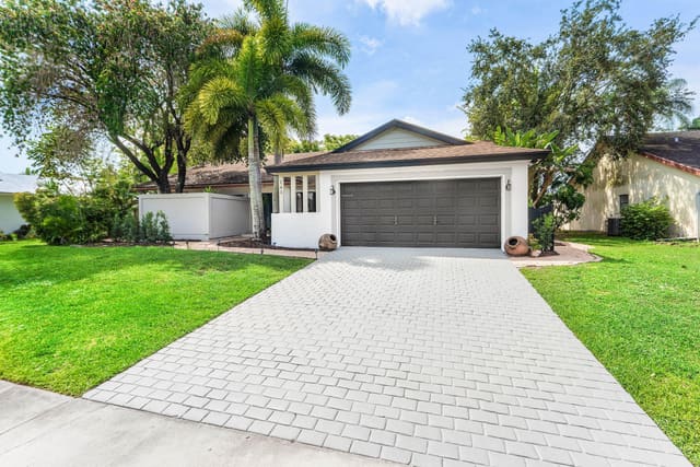 143 Miramar Avenue, sold in La Mancha 3, Royal Palm Beach, FL