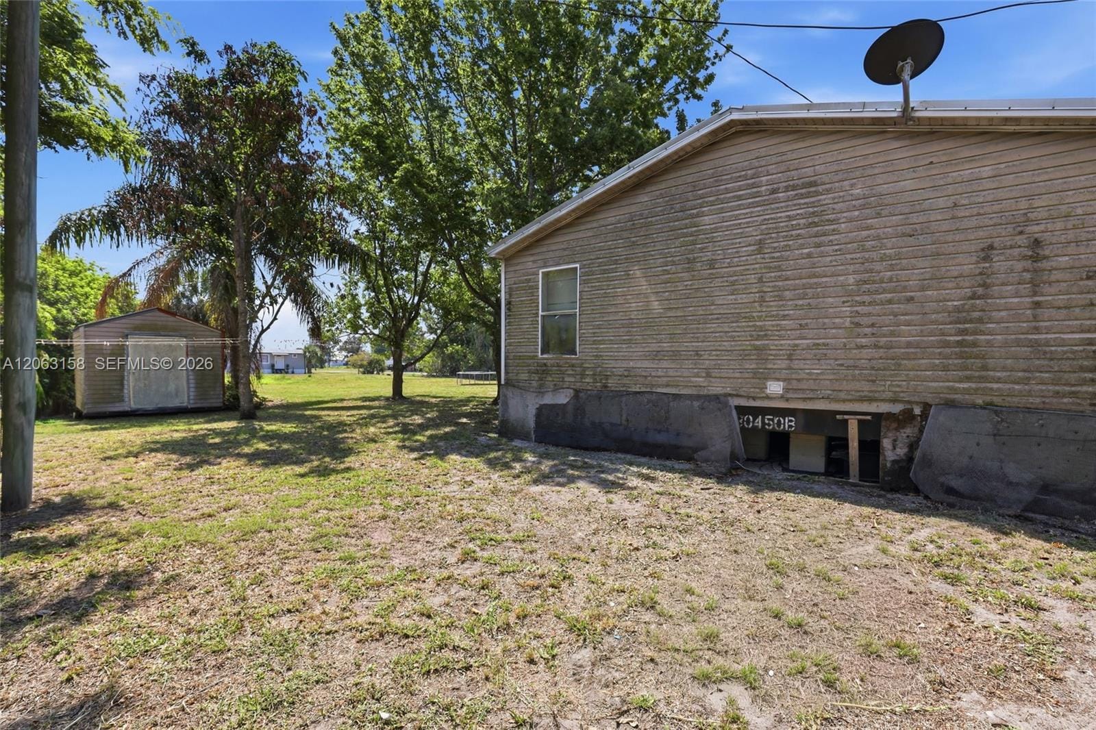 1031 Della Tobias, Clewiston, FL 33440 photo 1