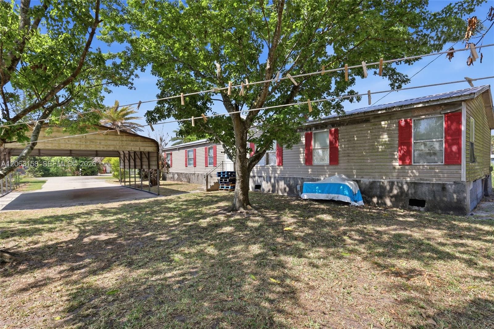 1031 Della Tobias, Clewiston, FL 33440 photo 2