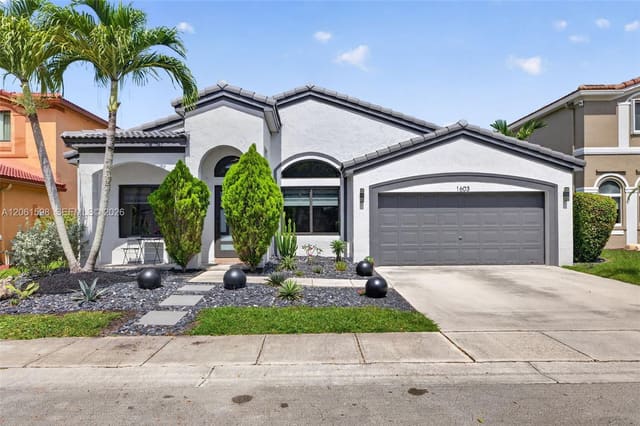 1603 E Harmony Lake Circle, sold in Village At Harmony Lake, Davie, FL