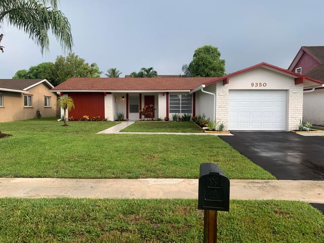9350 NW 38th Place, sold in Winding Lake Two At Welleby, Sunrise, FL