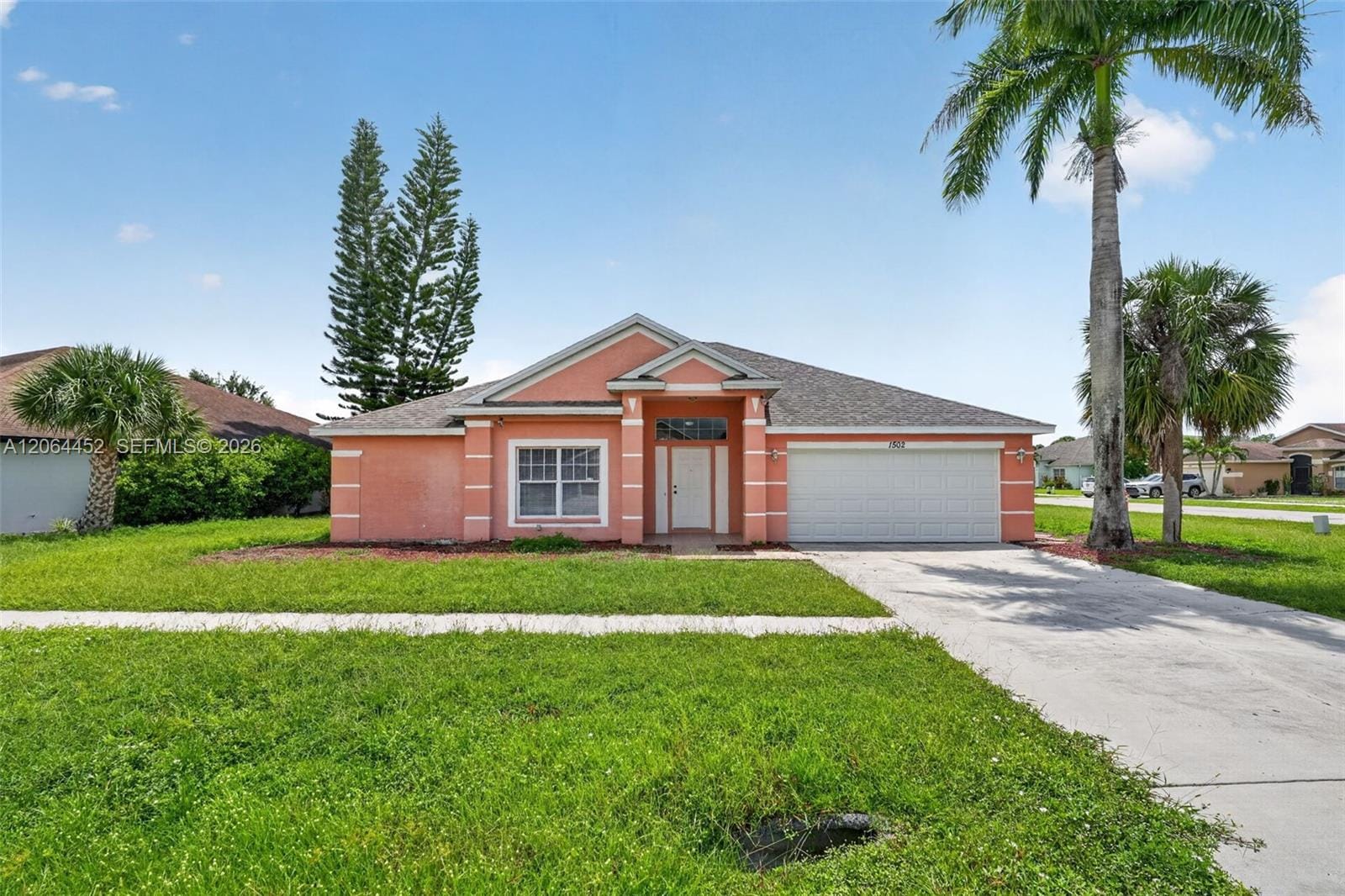1502 Scholar Court, Lehigh Acres, FL 33971