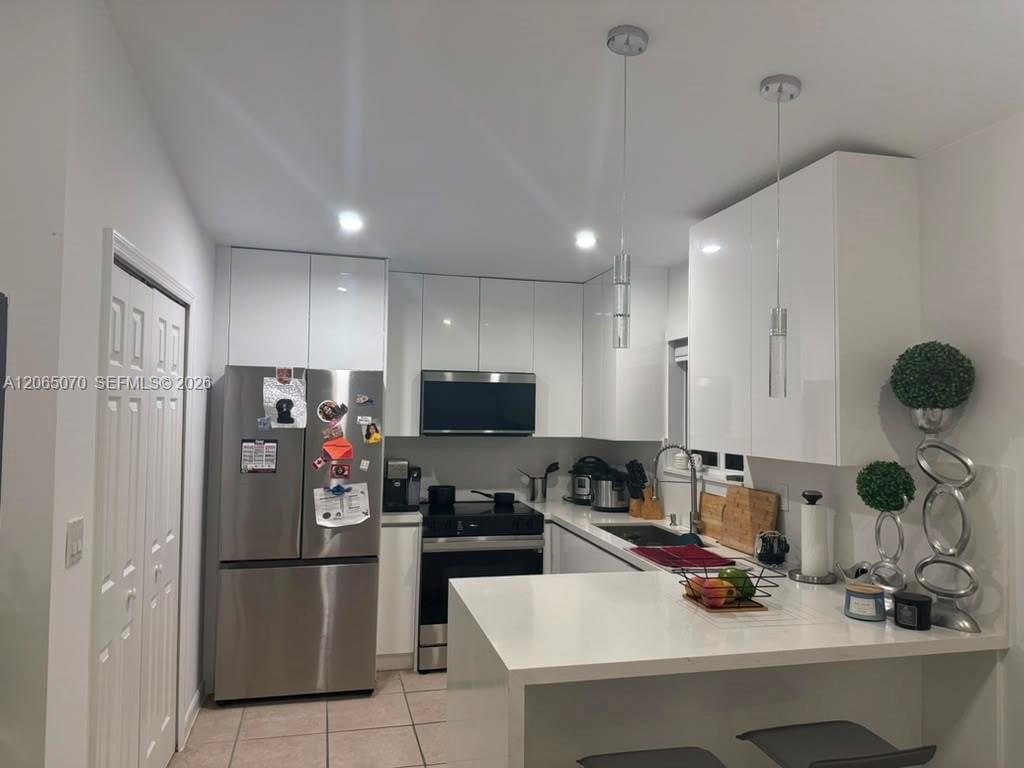945 NE 33rd Terrace 201 — photo 1