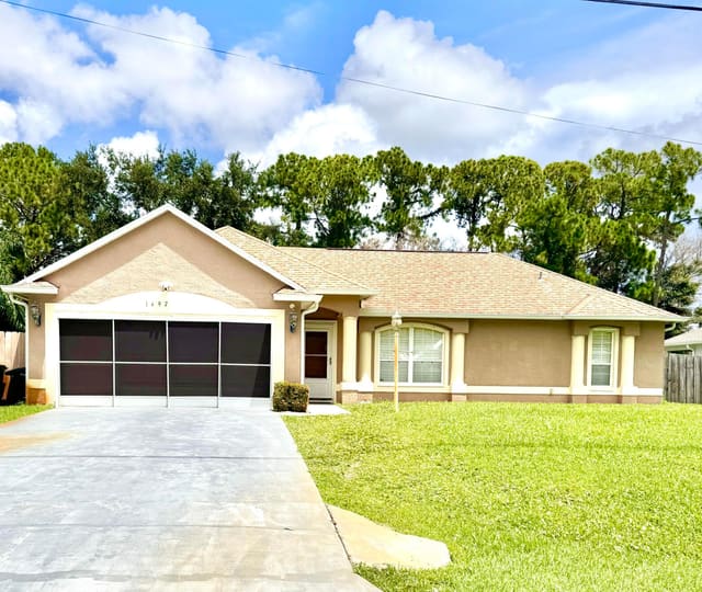 1497 SW Wepaco Avenue, sold in Port St Lucie Section 9, Port St Lucie, FL
