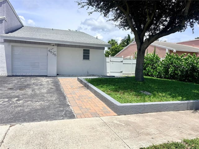 4835 NW 6th Court, under contract in Pine Trail, Delray Beach, FL