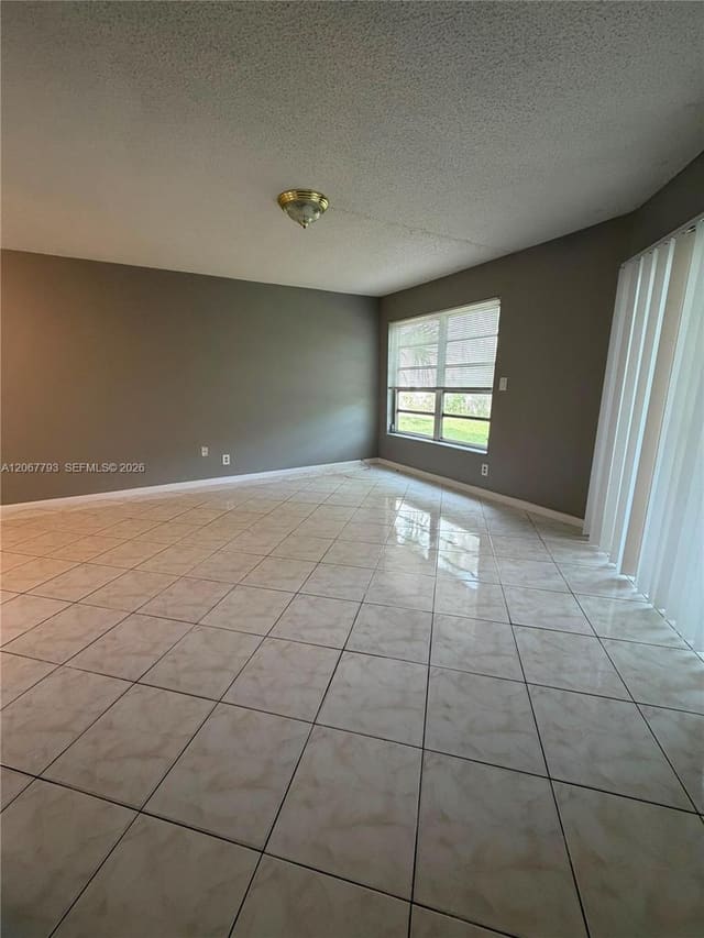 3100 Riverside Drive 104, Coral Springs, FL 33065