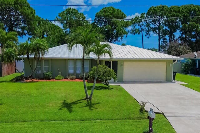 1967 SW Burlington Street, sold in Port St Lucie Section 9, Port St Lucie, FL